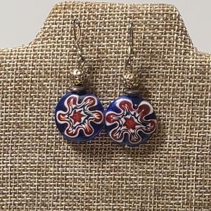 Murano Style Millefiori dangle earrings featuring a red, white, and blue floral